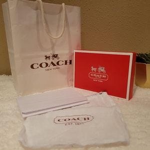Coach gift wrap set including shopping bag, box, dust bag, and tissue